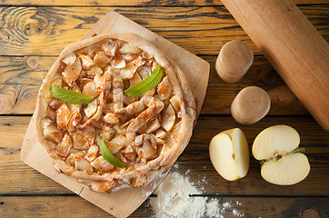 Image showing home made apple cake on the wooden table