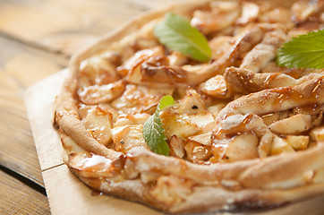 Image showing home made apple cake on the wooden table