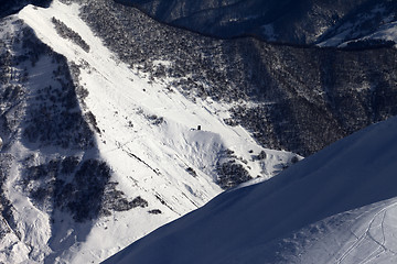 Image showing View from off-piste slope on snowy canyon