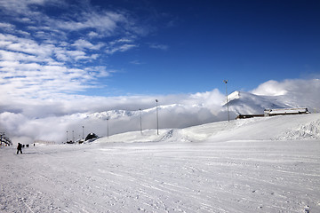 Image showing Ski slope at sun wind day