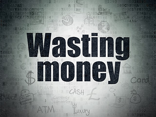 Image showing Money concept: Wasting Money on Digital Paper background