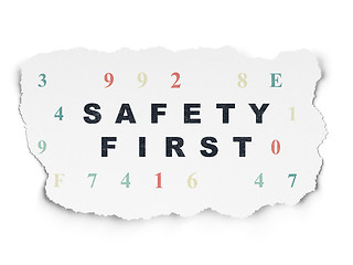 Image showing Protection concept: Safety First on Torn Paper background