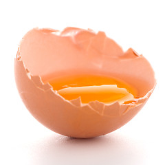 Image showing Broken egg on white