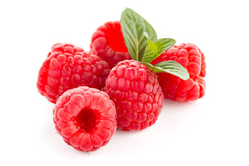 Image showing Ripe raspberry with leaf