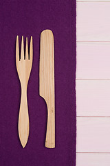 Image showing Kitchenware on purple towel