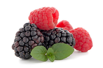 Image showing Raspberries and blackberry with mint leaf