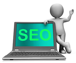 Image showing Seo Laptop And Character Shows Search Engine Optimization