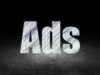 Image showing Marketing concept: Ads in grunge dark room