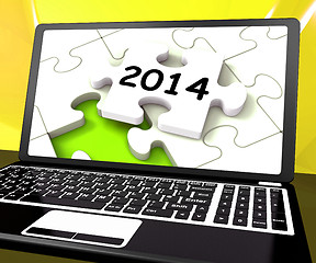 Image showing Two Thousand And Fourteen On Laptop Shows New Years Resolution 2