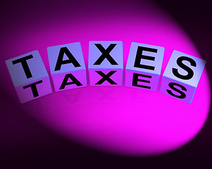 Image showing Taxes Dice Represent Duties and Taxation Documents