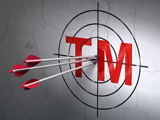 Image showing Law concept: arrows in Trademark target on wall background