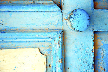 Image showing rusty metal      stripped paint in the  and morocco knocker