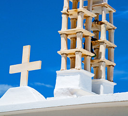 Image showing in cyclades      europe greece a cross the cloudy sky and bell