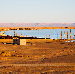 Image showing sunshine in the lake yellow  desert of morocco sand and     dune