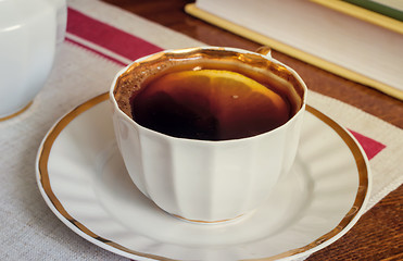 Image showing Still life : a Cup of black coffee on the table.