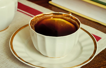 Image showing Still life : a Cup of black coffee on the table.