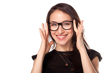 Image showing Happy woman with a new glasses at optics