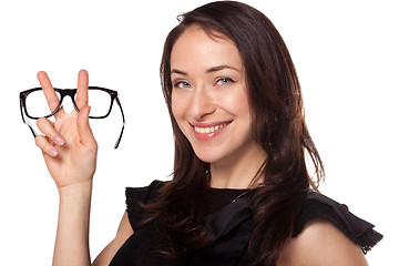 Image showing Happy woman with a new glasses at optics