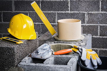 Image showing Construction of modular ceramic chimney in the house