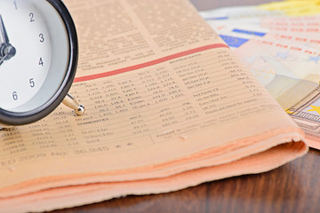 Image showing Close-up of clock, Euro banknotes and newspaper