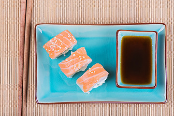 Image showing Top view to california maki sushi with salmon