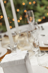 Image showing Christmas Gift with Place Setting at Table