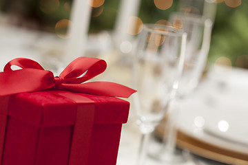 Image showing Christmas Gift with Place Setting at Table