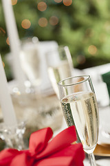 Image showing Christmas Gift with Place Setting at Table