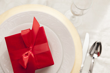 Image showing Christmas Gift with Place Setting at Table