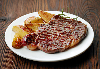 Image showing grilled beef steak and potatoes