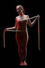 Image showing attractive naked woman with rope