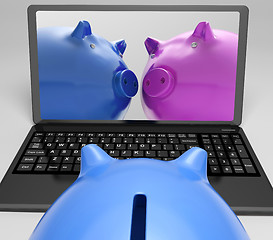 Image showing Piggybanks On Notebook Showing Online Transactions