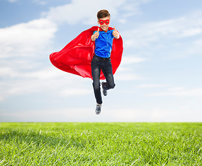 Image showing boy in super hero cape and mask showing thumbs up