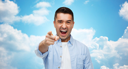 Image showing angry man shouting and pointing finger on you