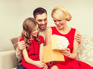 Image showing happy family opening gift box