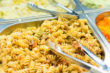 Image showing close up of pasta and dishes on catering tray