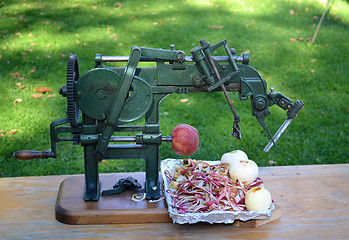 Image showing An antique apple peeler.