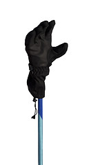 Image showing Winter sport gloves on ski pole