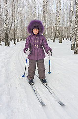 Image showing Winter portrait of the girl of four years on skis