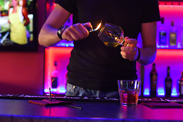 Image showing Making cocktail in bar