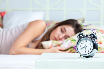 Image showing The young girl sleeping in bed