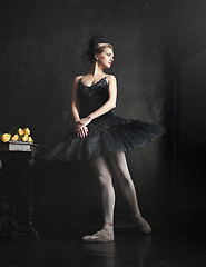 Image showing Portrait of the ballerina in ballet tatu on black background