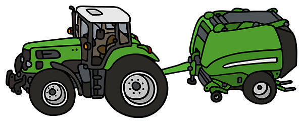 Image showing Tractor with a hay binder