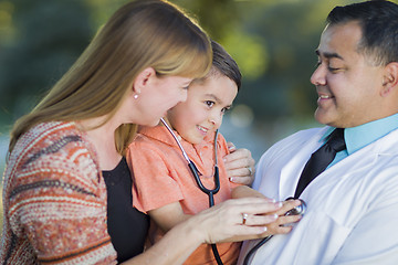 Image showing Mixed Race Boy, Mother and Doctor Having Fun With Stethoscope
