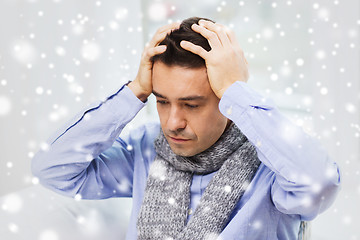 Image showing close up of ill man with flu and headache at home