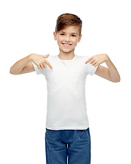 Image showing happy boy pointing finger to his white t-shirt