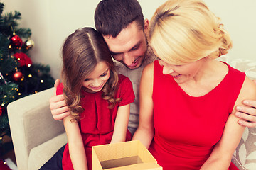 Image showing happy family opening gift box