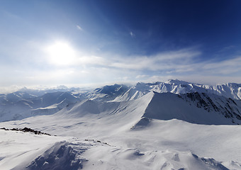 Image showing View on off-piste slope and sky with sun