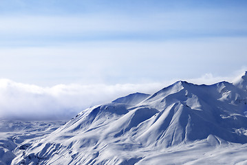 Image showing Evening sunlight mountains in cloud