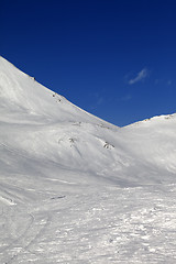 Image showing Snowy skiing piste in nice sun day